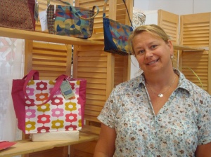 Janet showing off some new fabric on one of her wonderful bags.